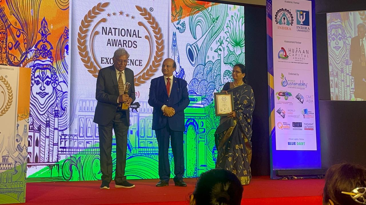 Dr. Gupta receiving award